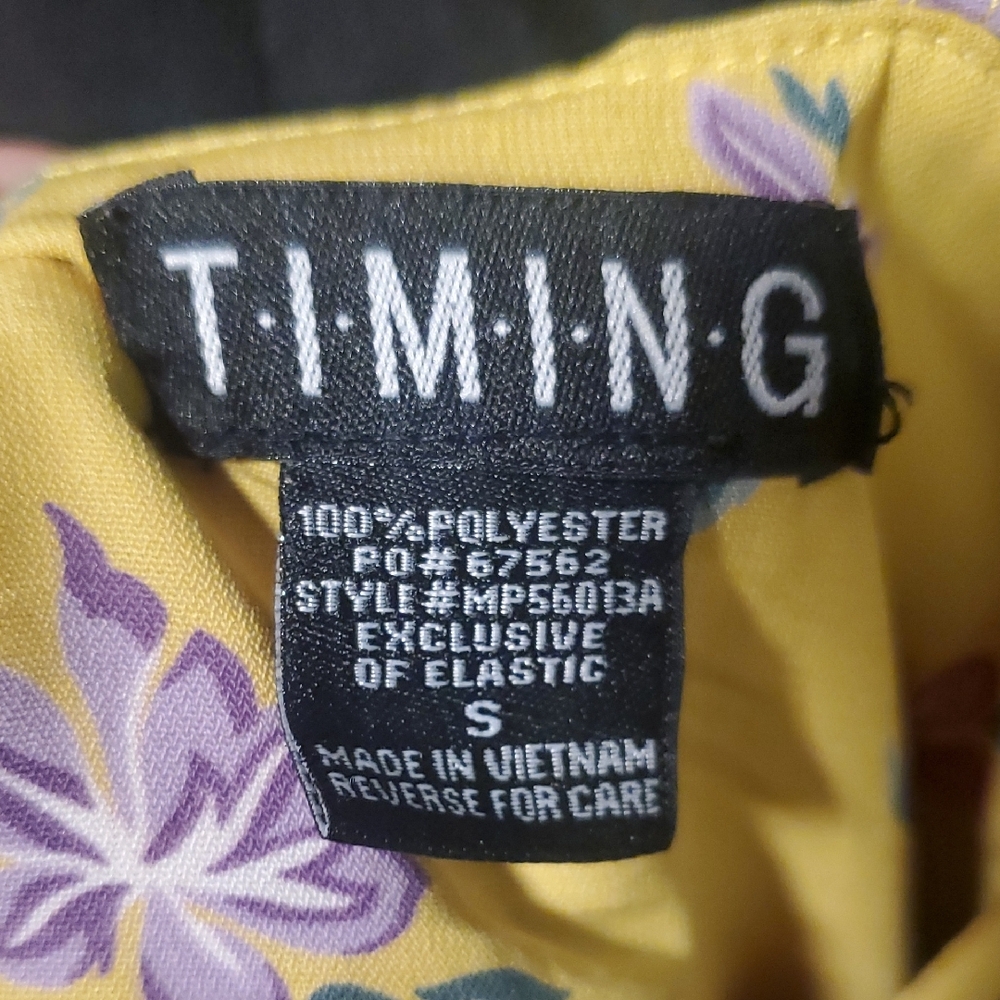 Timing Yellow Floral Ruffle Romper - Picture 2 of 11